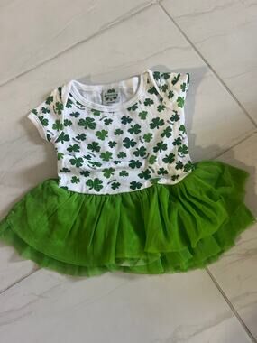 St Patrick’s day girl onesie dress. Used once in great conditions. Size 0-6 M